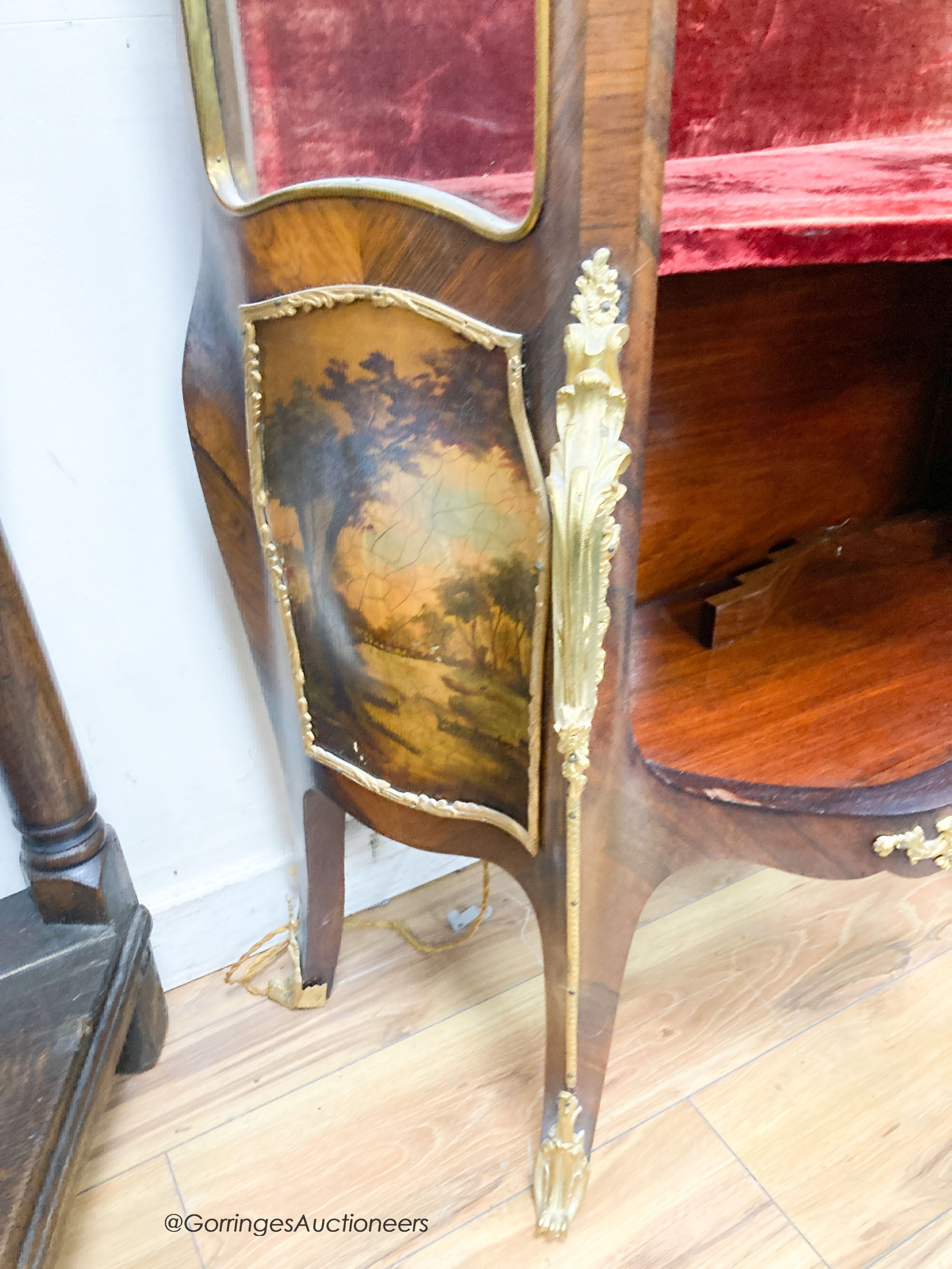 A Louis XV style kingwood bombe vitrine, with Vernis Martin style panels and ormolu mounts, width 74cm, depth 40cm, height 176cm